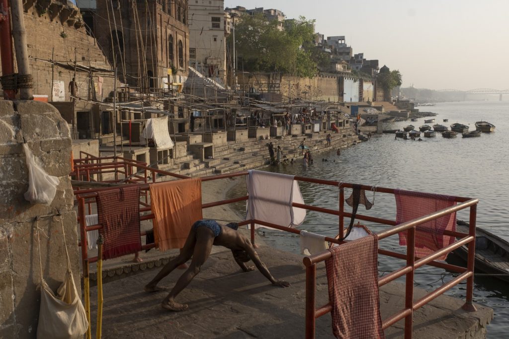 Morning yoga practice along the Ganges River, or Ganga, in the early morning of April 1, 2019.